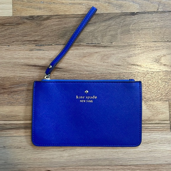 kate spade Handbags - Royal blue Kate Spade wristlet NWOT
